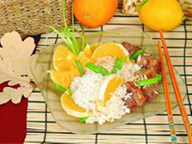 Свинина смажена з рисом і апельсинами рецепт з фото 
