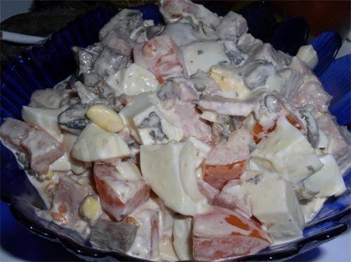 Смачний салат з м'яса крабів і грибів рецепт з фото 